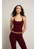 Maroon leggings on a white background

